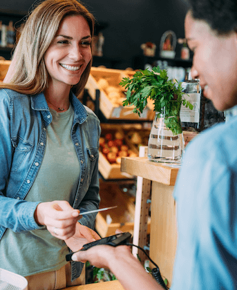 Woman making card payment